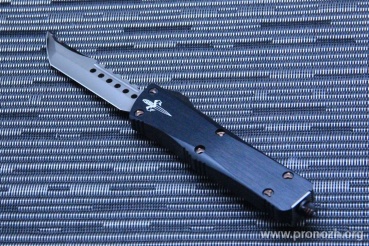      Microtech Troodon Hellhound, Mirror Polish, Anodized Hefted Alloyw/ Copper Ringed Hardware