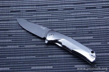 C  Lion Steel T.R.E. (Three Rapid Exchange), Damasteel AB "Thor" Pattern Blade, Polished Milled Titanium Handles, Polished Milled Titanium  Accents